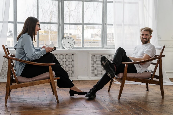 health expert laughing together with its patient